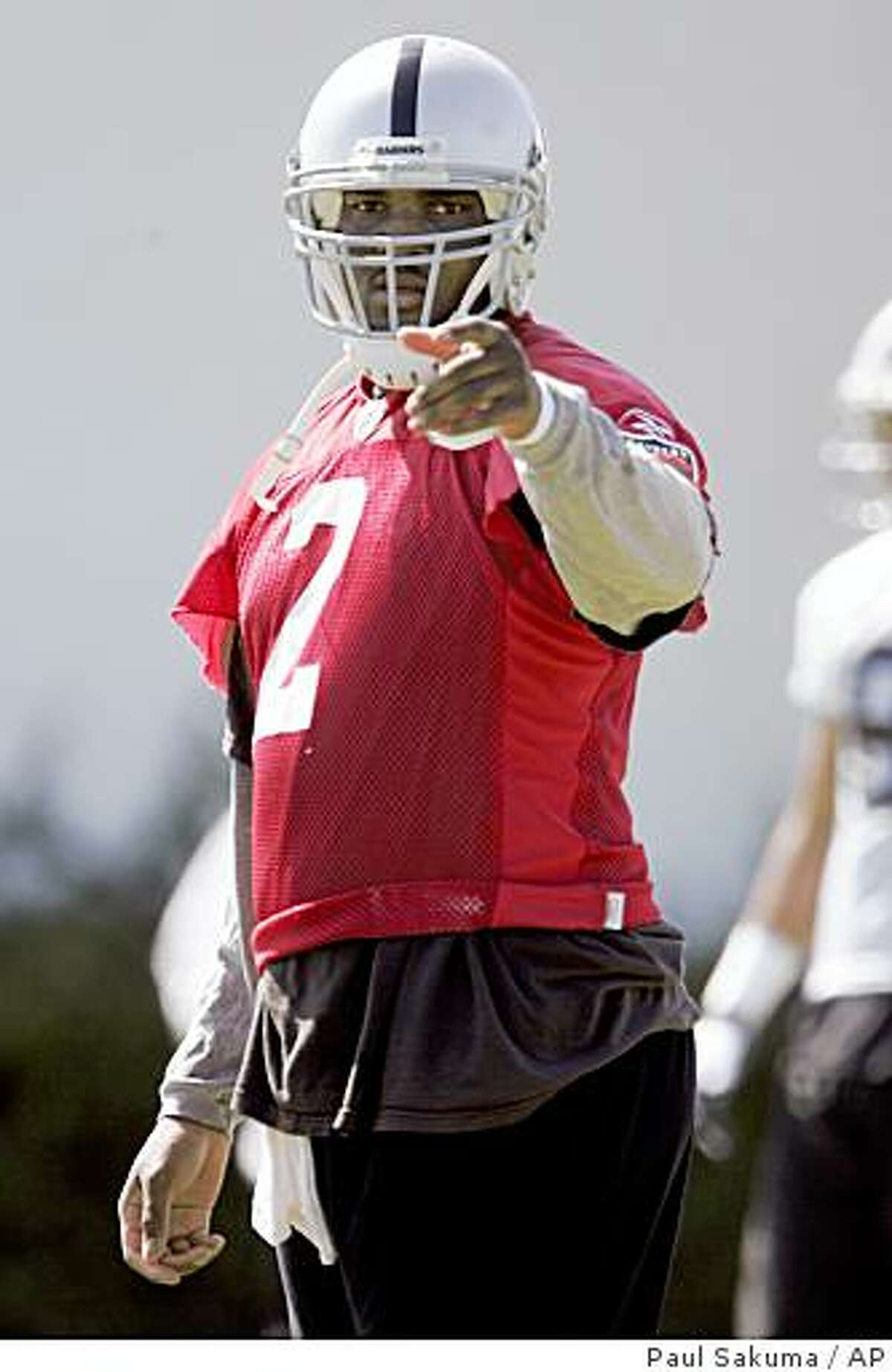 Oakland Raiders quarterback JaMarcus Russell (2) points during practice at Raiders headquarters in Alameda, Calif., Wednesday, May 20, 2009.