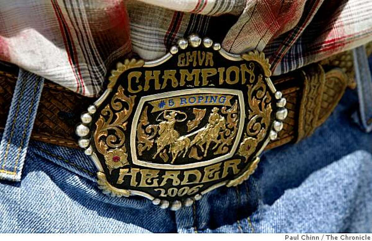 San Francisco 49ers draft pick Bear Pascoe wears the belt buckle that he won in 2006 as a champion roper in Terra Bella, Calif., on Thursday, May 14, 2009.