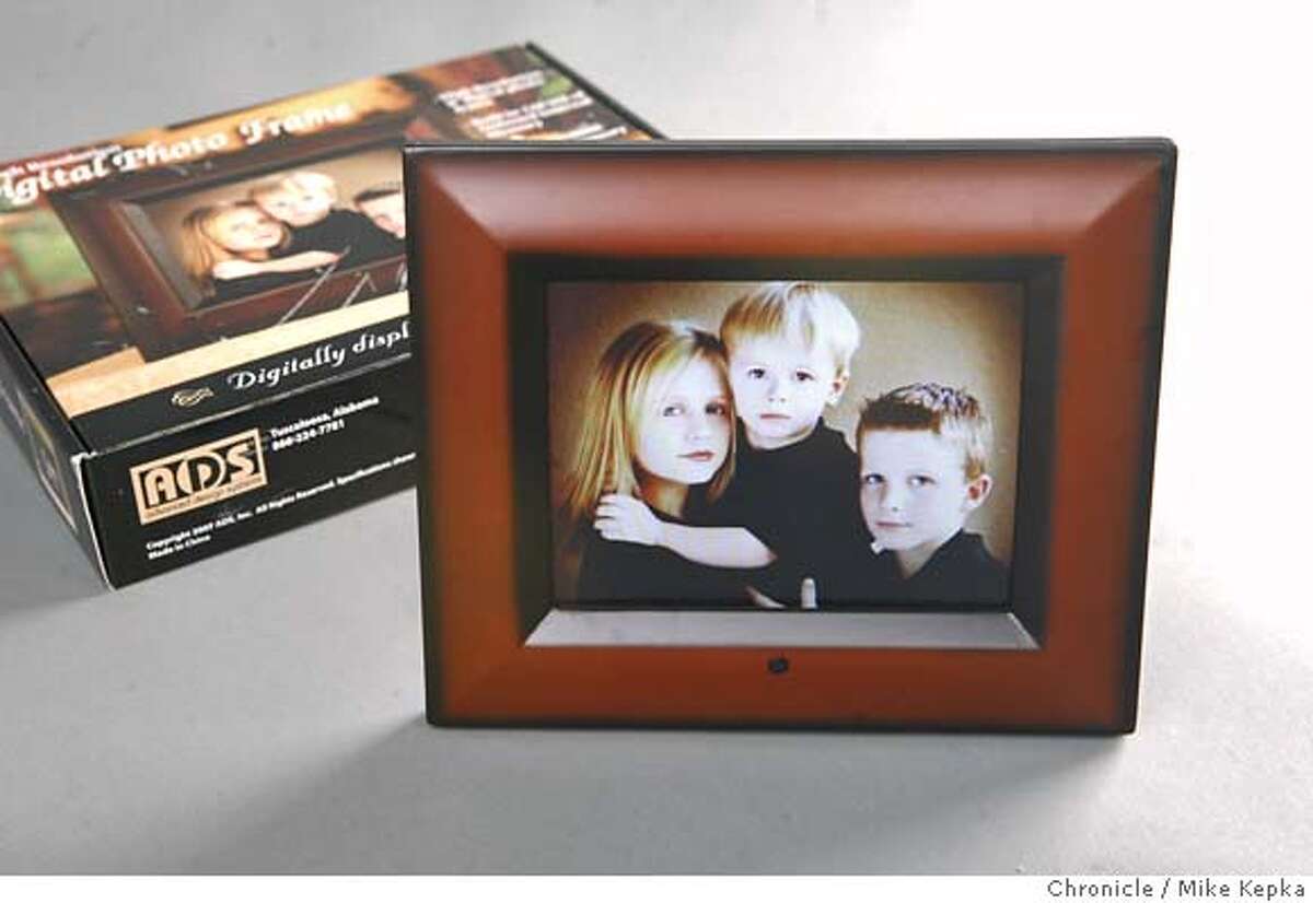 Sold at Sam's Club, the ADS Digital Photo Frame - 8" has reportedly been the vector for cases of malware after a Bethesda research institute specializing in information security reported cases of computers being infected by digital photo frames. Mike Kepka / The Chronicle MANDATORY CREDIT FOR PHOTOG AND SAN FRANCISCO CHRONICLE/NO SALES-MAGS OUT