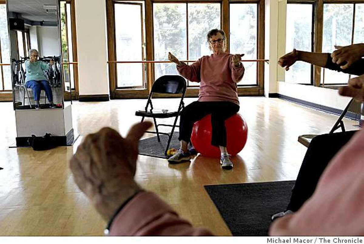 Julie Gregg, participates in the "Sit and Be Fit" senior exercise program at the Shih Yu-Lang Central YMCA in the Tenderloin of San Francsico, Calif. on Wednesday May 6, 2009. While the gym, fitness room and pool are closing down on June 30th the senior programs will close in the fall.