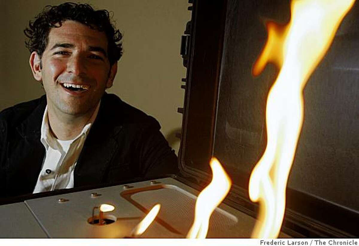 Brett Levine owns a new San Francisco-based company, LiveSpark, where he invented a way to computerize gas-powered fireplaces to make the flames "dance" in time to music on May 22, 2009.