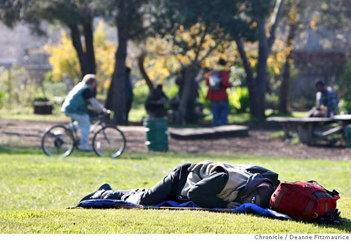 peoplespark13_060_df.jpg A man sleeps in the park during the daylight hours. A UC citizen's committee wants to overhaul People's Park, where many homeless people spend their time. Photographed in Berkeley on 1/12/08. Deanne Fitzmaurice / The Chronicle