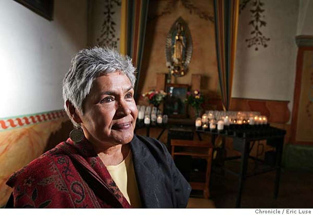 Guadalupe Candelaria is the retired office manager of San Juan Bautista's Mission Church, where devotees will gather early Wednesday to honor the Virgen de Guadalupe. Chronicle photo by Eric Luse