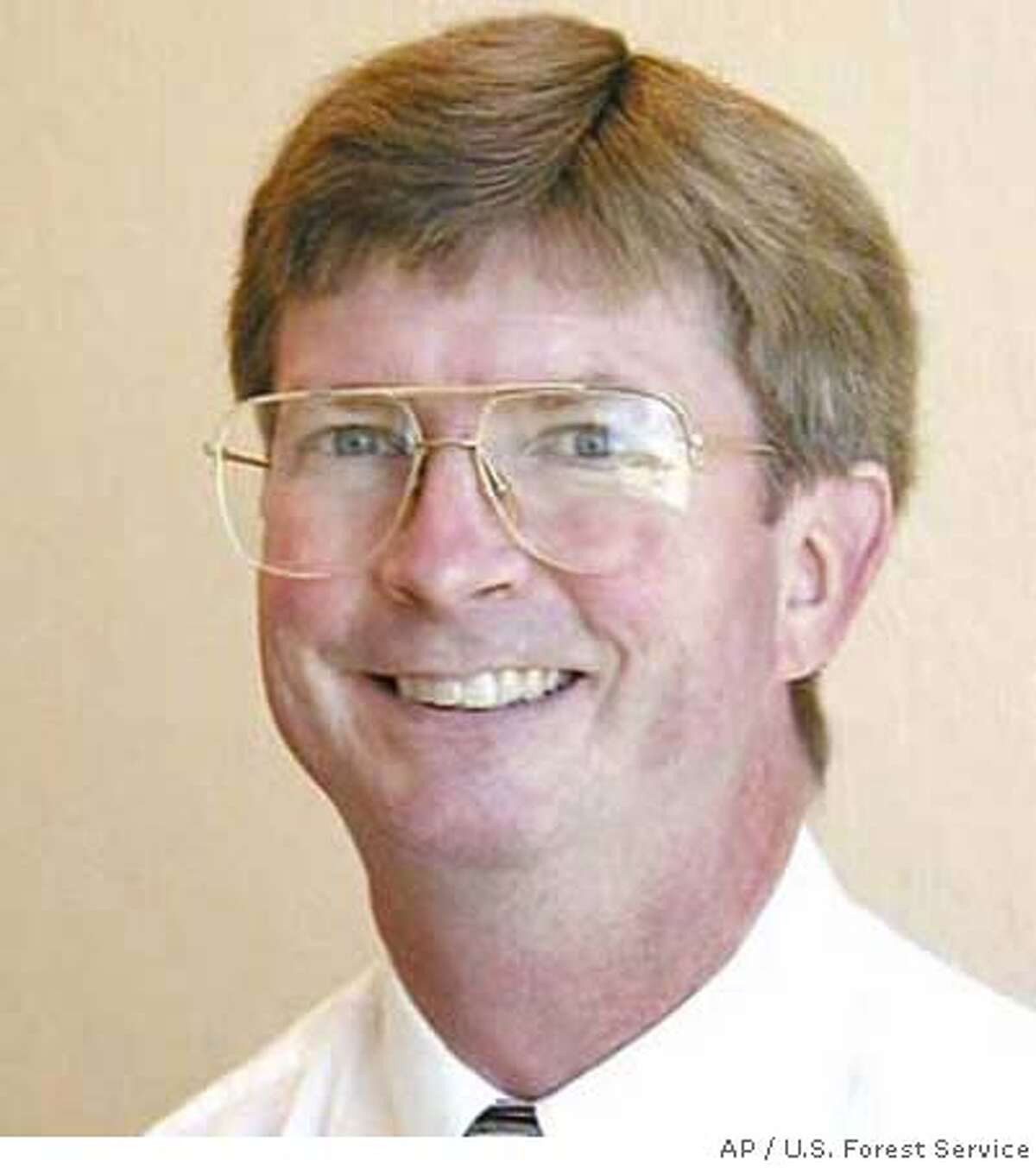 This undated photo released by the U.S. Forest Service shows Matt Mathes, the long-serving public voice of the U.S. Forest Service in California who police say shot his ailing wife and himself to death. Mathes, 54, and his wife, 52-year-old Karen Pang Mathes, were found dead in their Northern California home on Saturday, Nov.3, 2007, from gunshot wounds.(AP Photo/U.S. Forest Service ) DATE OF PHOTO UNKNOWN.PHOTO RELEASED BY THE U.S. FOREST SERVICE