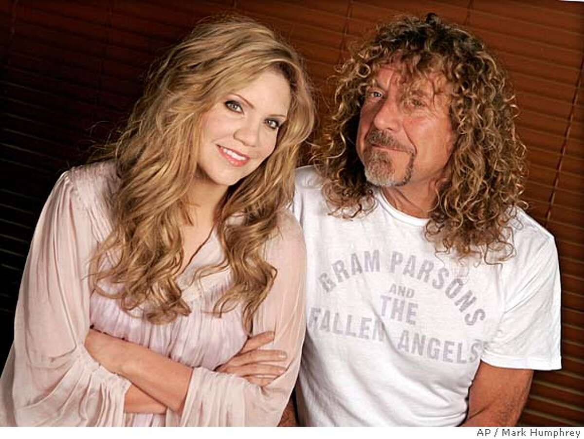 Bluegrass star Alison Krauss and singer Robert Plant are photographed in Nashville, Tenn., on Oct. 11, 2007. The two have put their different styles together on the album "Raising Sand," and what results is neither rock, nor bluegrass. (AP Photo/Mark Humphrey)