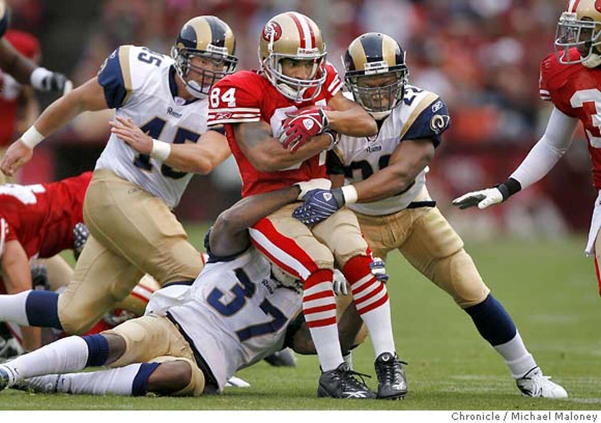 San Francisco 49ers Michael Lewis is corralled in the 2nd quarter. The San Francisco 49ers host the St Louis Rams at Monster Park in San Francisco. Photo taken on 11/18/07, in San Francisco, CA. Photo by Michael Maloney / San Francisco Chronicle