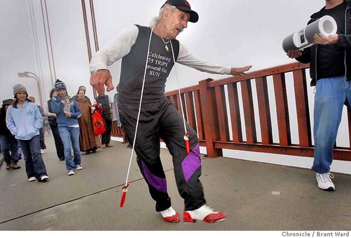 tap_601.JPG Michael Grbich semed to enjoy his long dance...he even brought his own music and jump rope. Oakland resident Michael Grbich celebrated his 75th birthday Sunday by tap dancing across the Golden Gate Bridge. He recently took up dancing, and was joined by relatives and friends as he danced his way across the foggy span. {By Brant Ward/San Francisco Chronicle}11/18/07