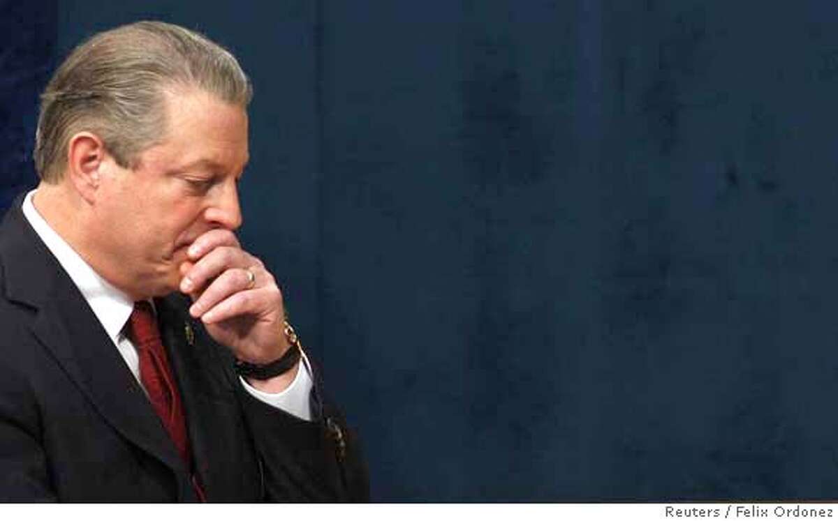 Former U.S. Vice-President Al Gore gestures during the 2007 Prince of Asturias award ceremony, where he received an award in the International Cooperation category, at Campoamor theatre in Oviedo, northern Spain, October 26, 2007. REUTERS/Felix Ordonez (SPAIN)