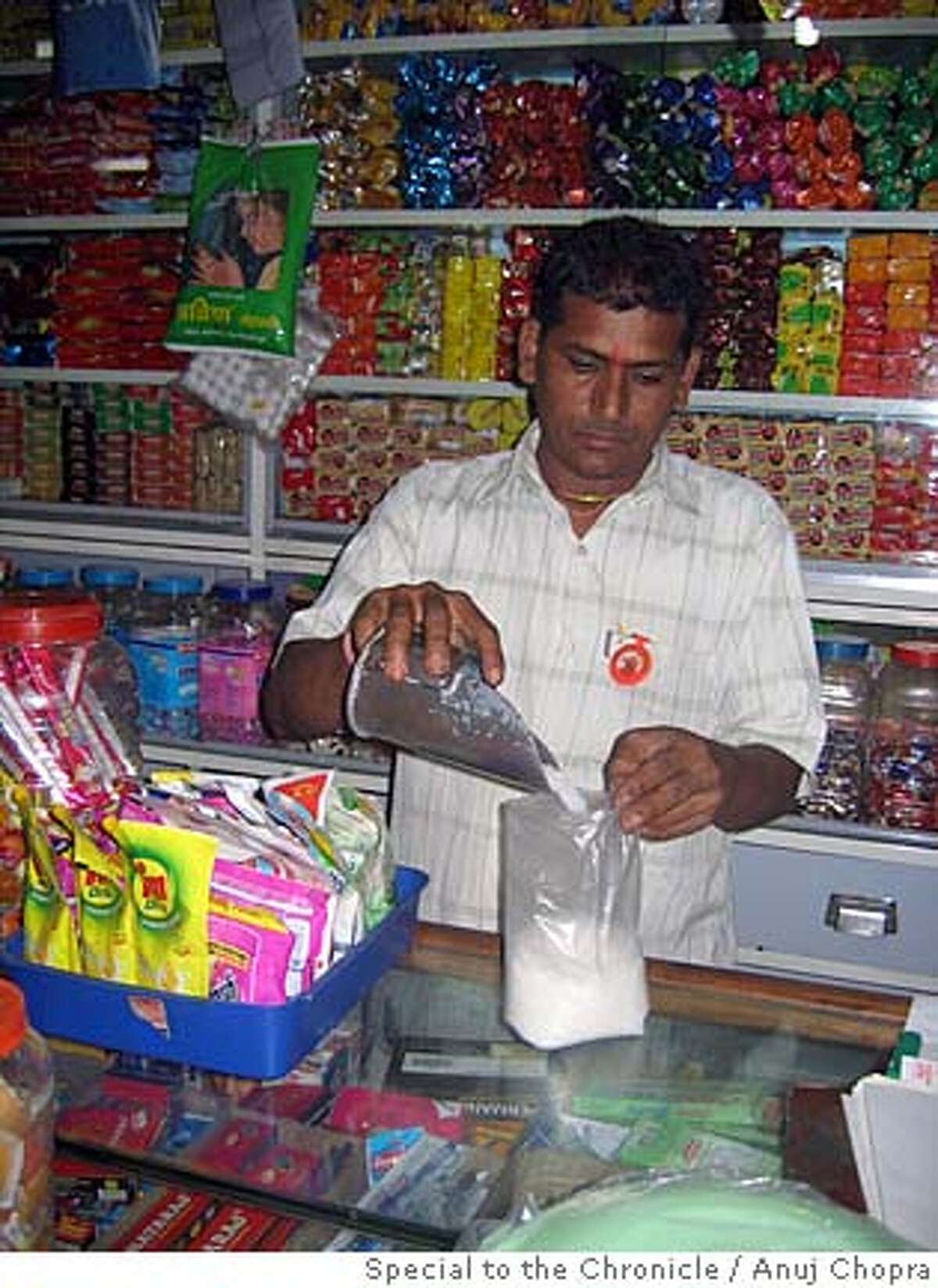 Tiny, dark grocery squeezed by big box