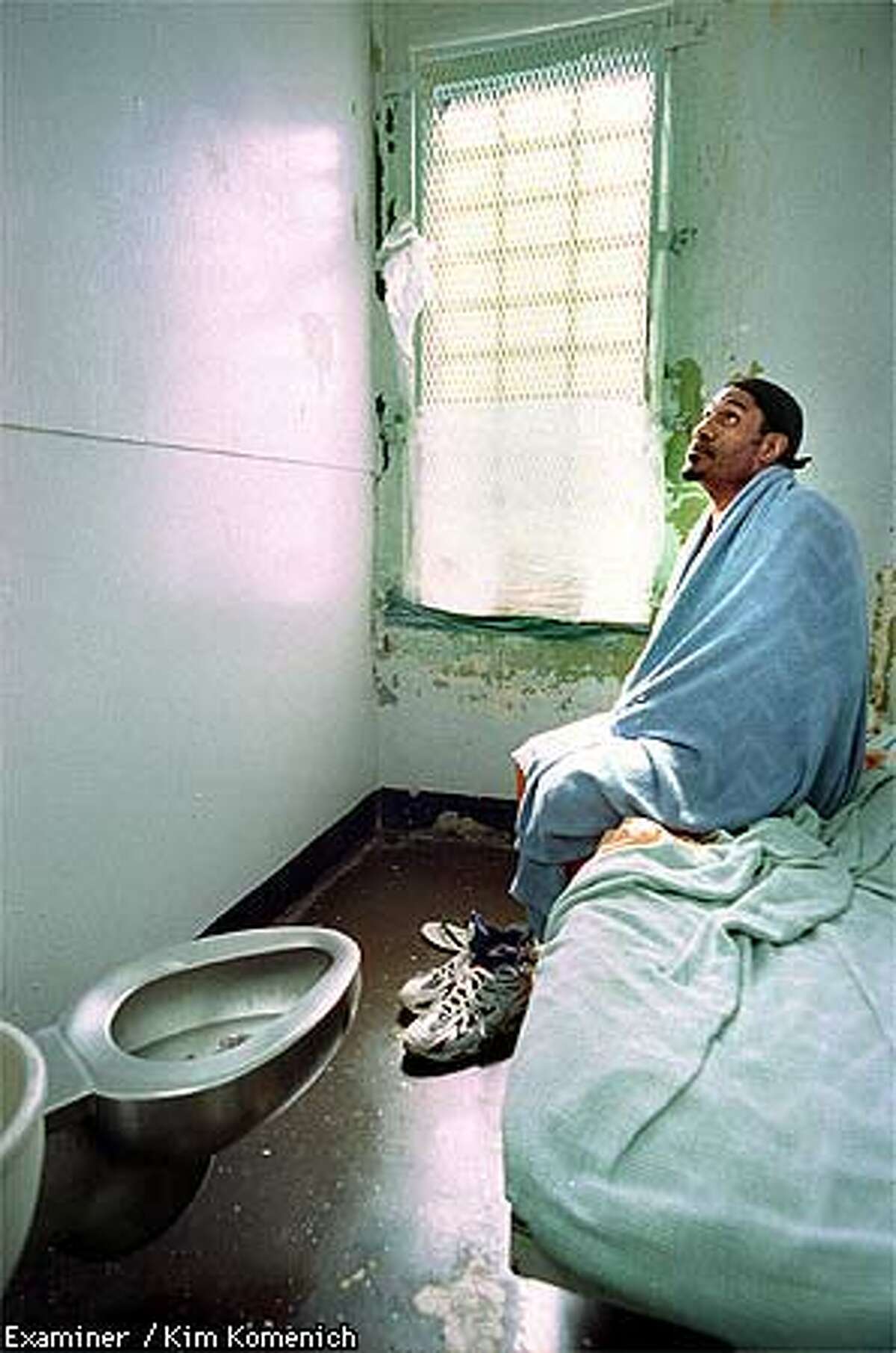 Inmates sleep on floors in overflowing cell blocks