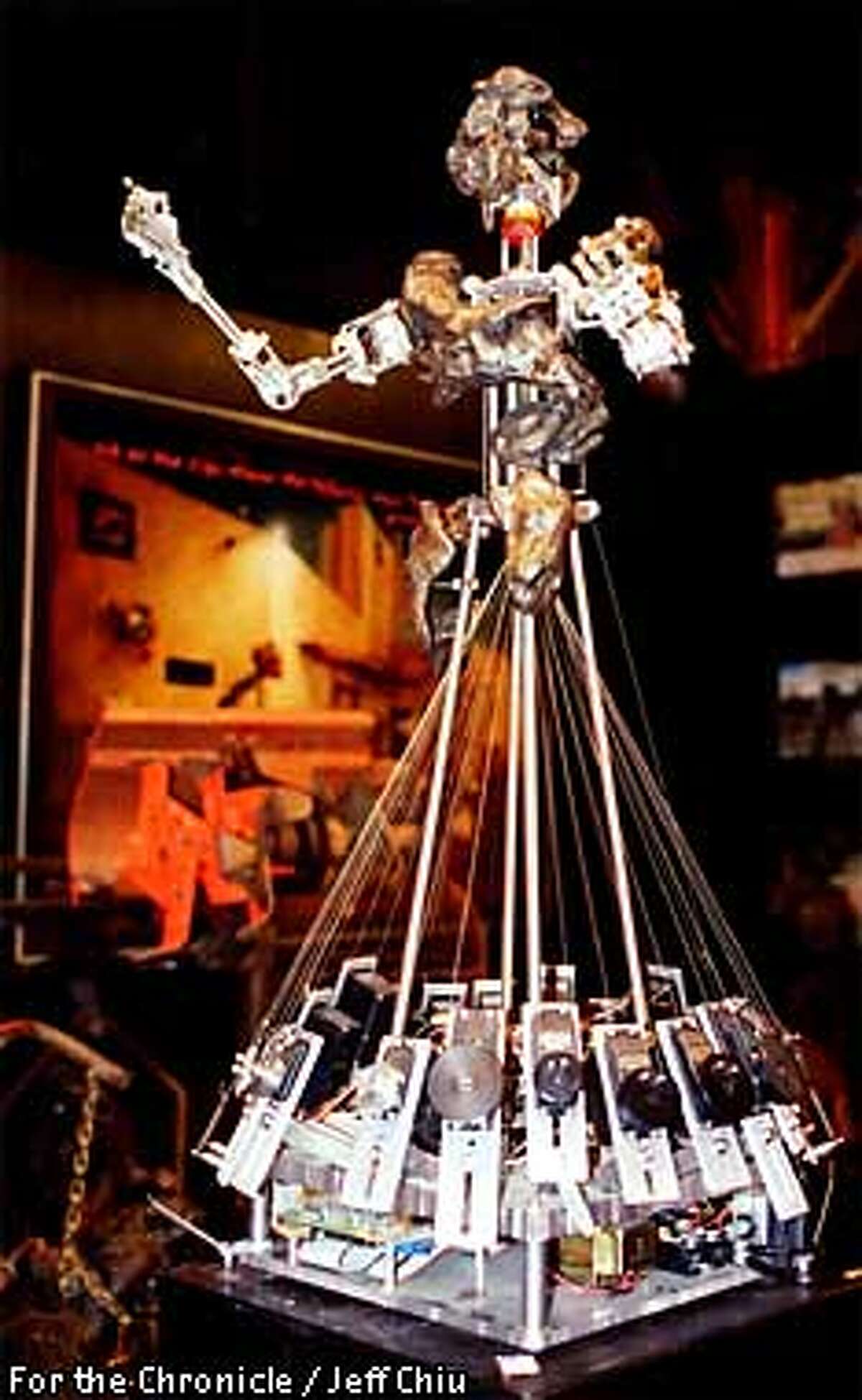 MECHANICAL ANIMAL: Robot Slave 1, designed by Carl Pisaturo of Omnicircus, performed during the group's ``Scabaret.'' For the Chronicle by Jeff Chiu