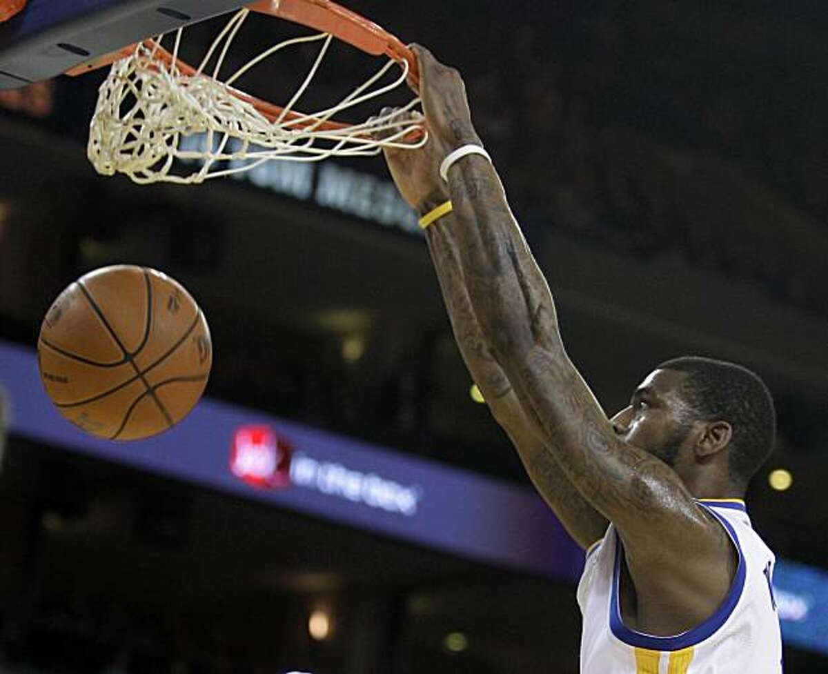 Golden State Warriors' Dorell Wright sinks a basket against the Philadelphia 76ers during the first half of an NBA basketball game Monday, Dec. 27, 2010, in Oakland, Calif.