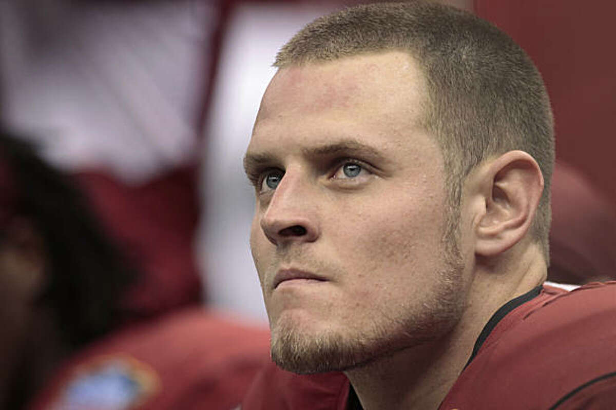 Arkansas quarterback Ryan Mallett watches from the bench in the first half during the Sugar Bowl NCAA college football game against Ohio State at the Louisiana Superdome in New Orleans, Tuesday, Jan. 4, 2011. (AP Photo/Dave Martin)