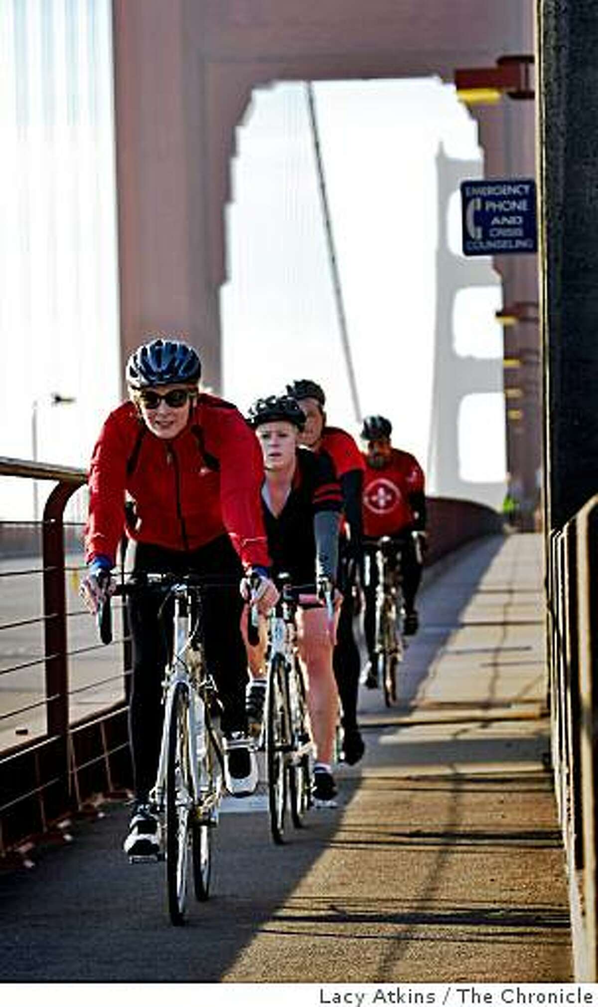 Bike riders from the group Positive Pedaler start their training for the World AIDS Ride, as they ride along the westend of the Golden Gate Bridge, Sunday Nov. 30, 2008, in San Francisco, Calif. Positive Pedaler is a group of riders who raises money and awareness to stop AIDS.