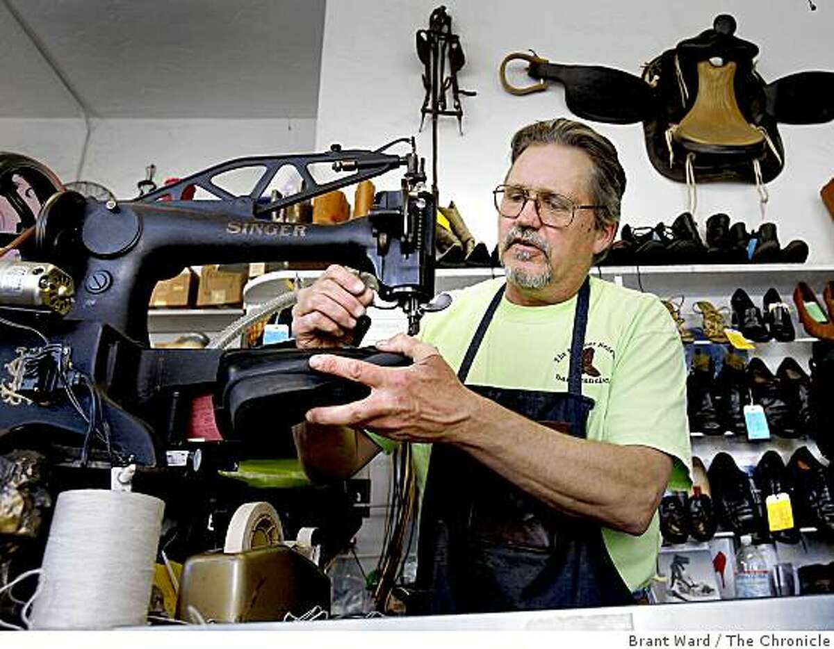 Owner Al Stanley uses an old Singer machine which allows him to stitch areas within a shoe. Pioneer Renewer Shop is a neighborhood cobbler which has seen a brisk increase in business recently. The shop on 18th Street in San Francisco specializes in the old-school art of shoe repair.