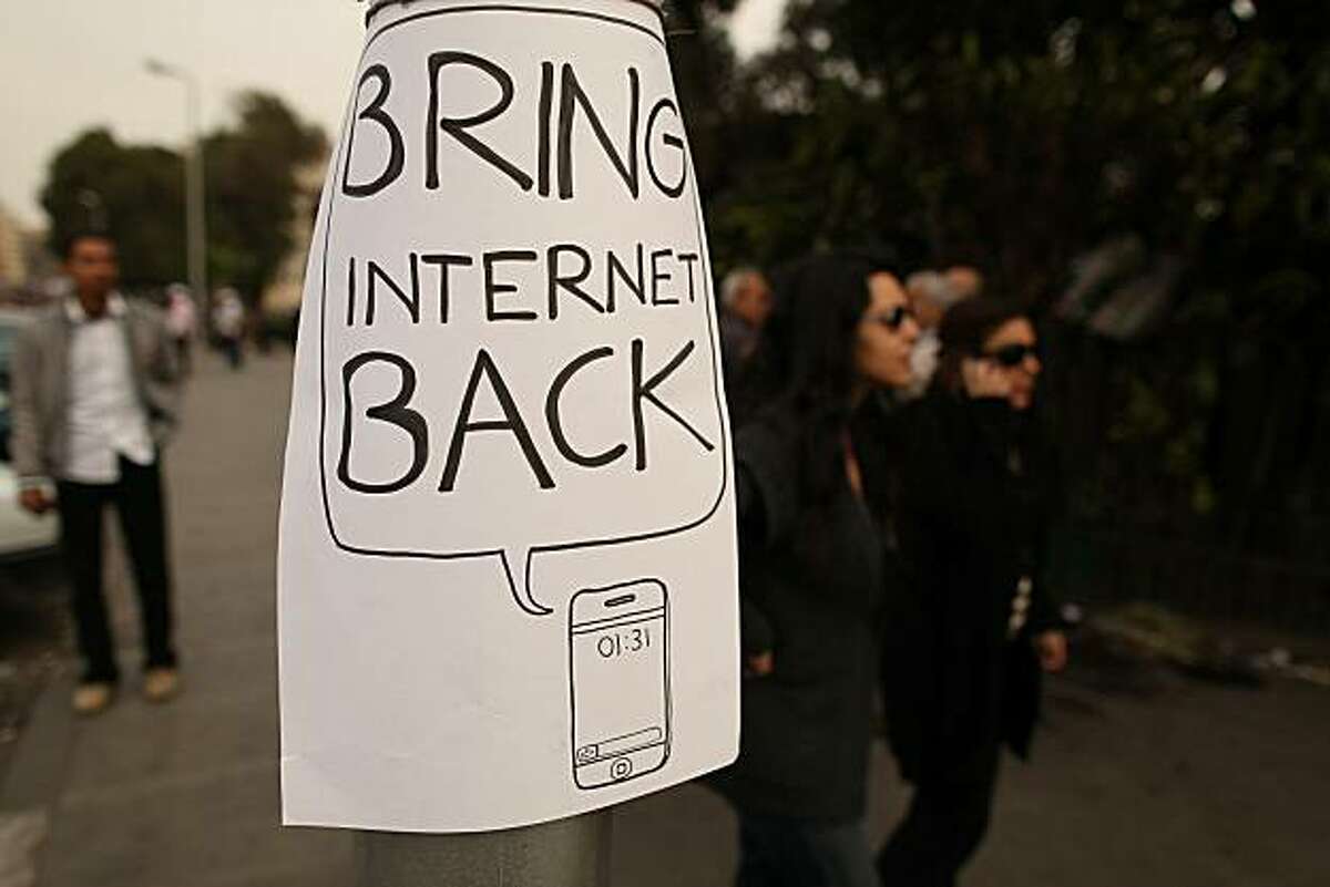 CAIRO, EGYPT - FEBRUARY 01: A poster placed on a lamp post calls for the return of the internet after it was shut down by the government on February 1, 2011 in Cairo, Egypt. Protests in Egypt continued with the largest gathering yet, with many tens of thousands assembling in central Cairo, demanding the ouster of Egyptian President Hosni Mubarek. The Egyptian army has said it will not fire on protestors as they gather in large numbers in central Cairo.