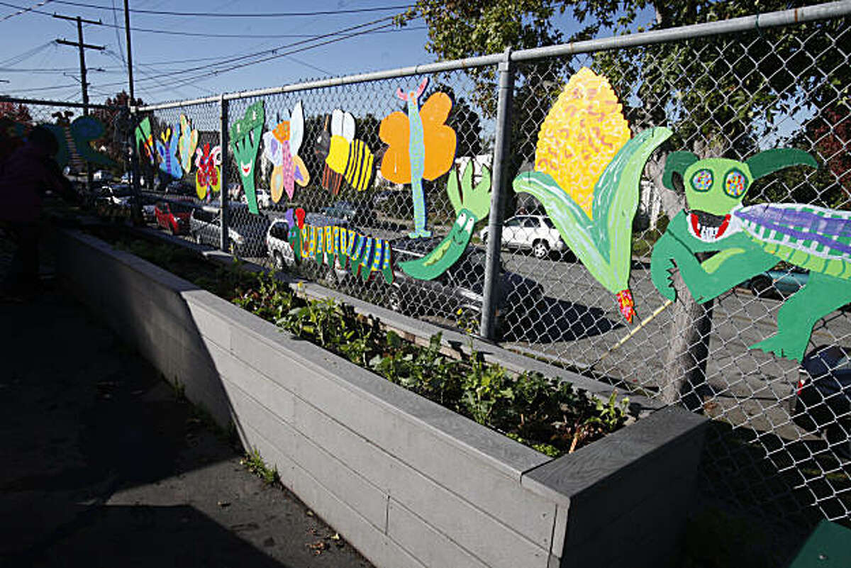 Art hanging in the garden area at Marin Elementary School brightens up the play area on Wednesday, Nov. 24, 2010 in Albany, Calif. The art project is funded in part by the school's PTA and parent donations.