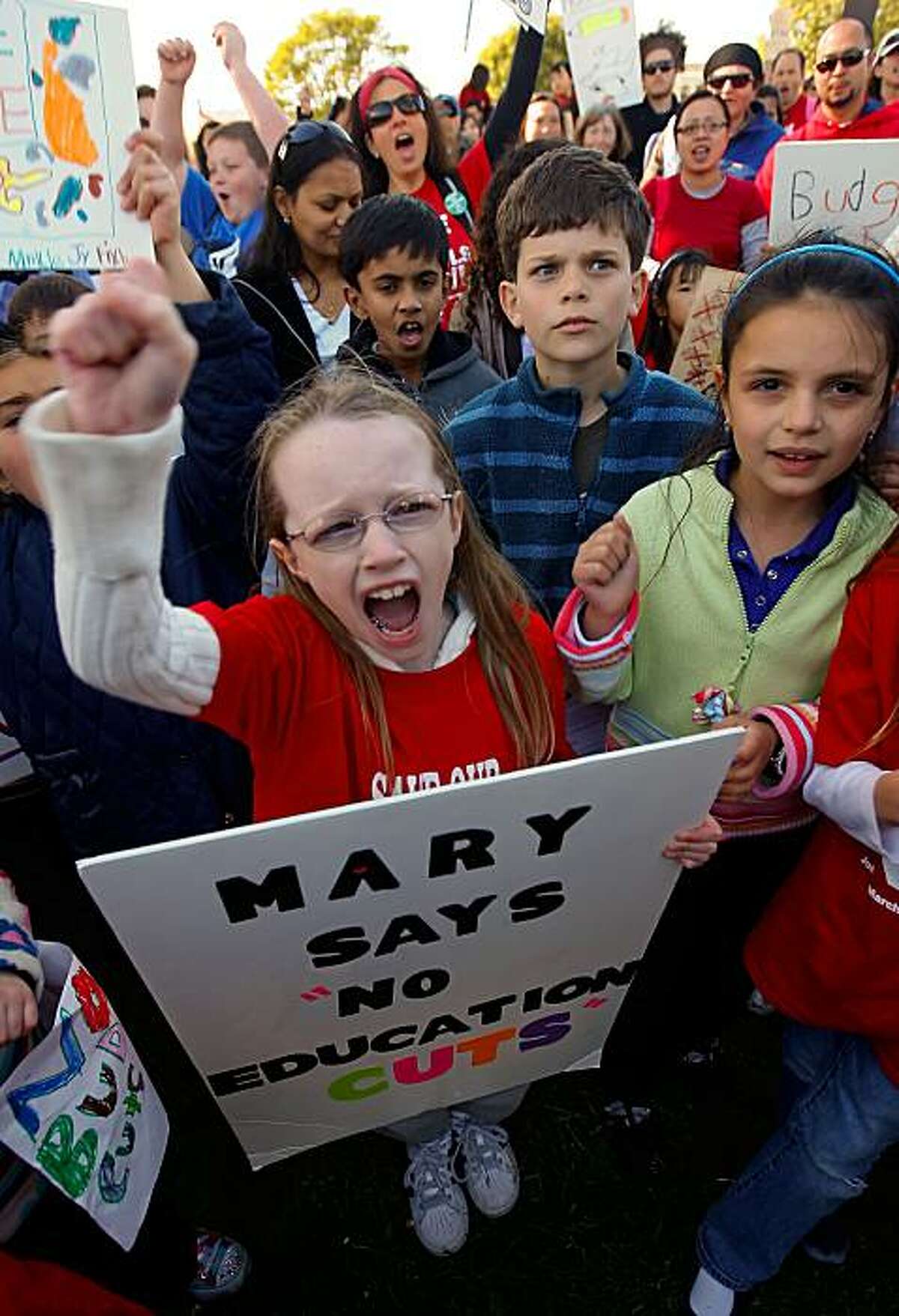 2nd grader, Mary Kyne of Diane Feinstein Elementary School in San Francisco, Ca., gathered with students, parents and teachers as they marched from school to Larsen Park for a rally. They joined several public schools in San Francisco for the Day of Action protest to defend the funding of public education on Thursday Mar. 4, 2010.