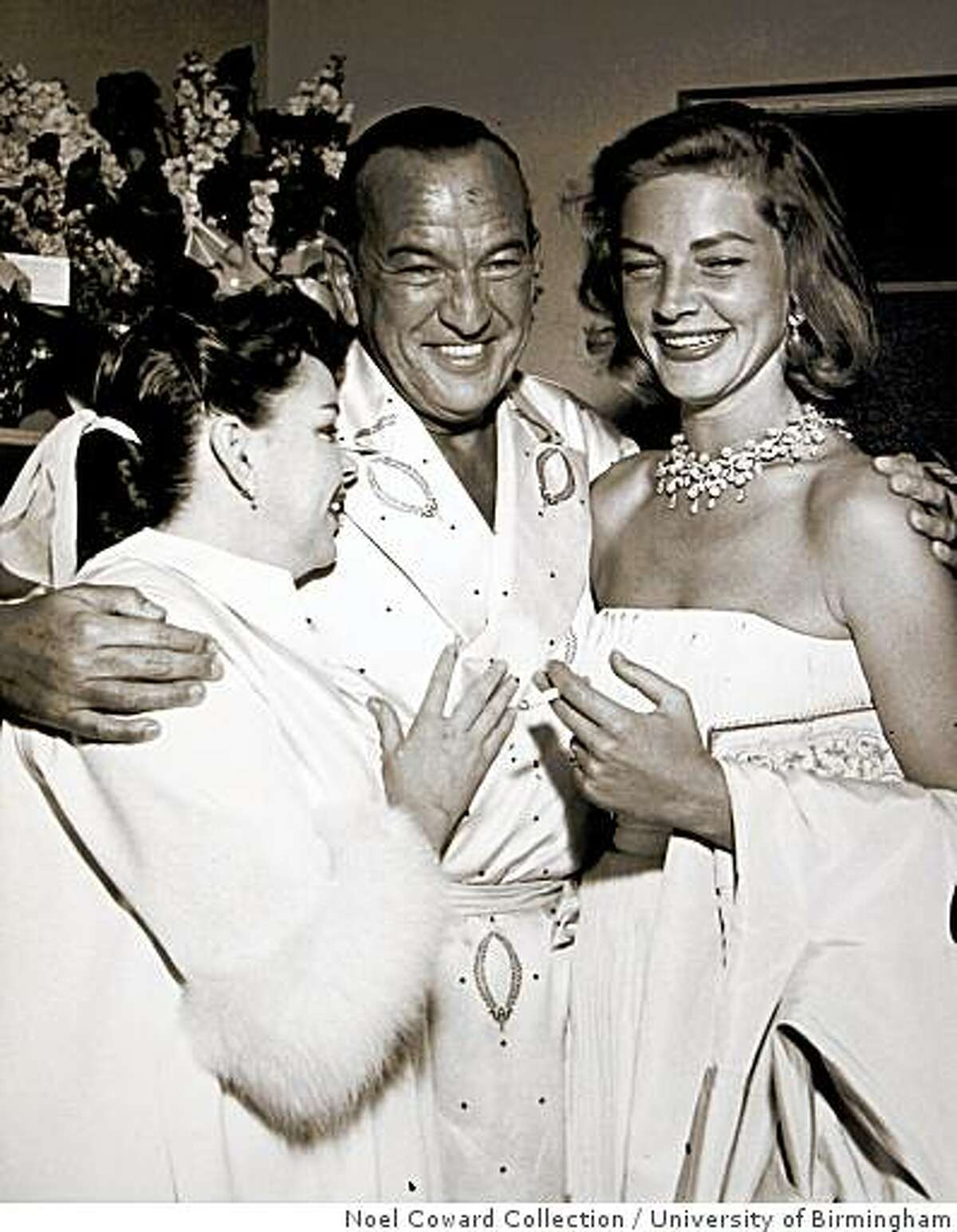 After experiencing a serious career slump following the Second World War, Coward came back with a vengeance in a smash hit nightclub act of his own songs. His star-turn in Las Vegas lead to a complete resurgence of Coward?s career. He?s shown here backstage at Wilbur Clark?s Desert Inn in Las Vegas with Judy Garland and Lauren Bacall, 1955. The dressing gown pictured here is on display in the exhibition.