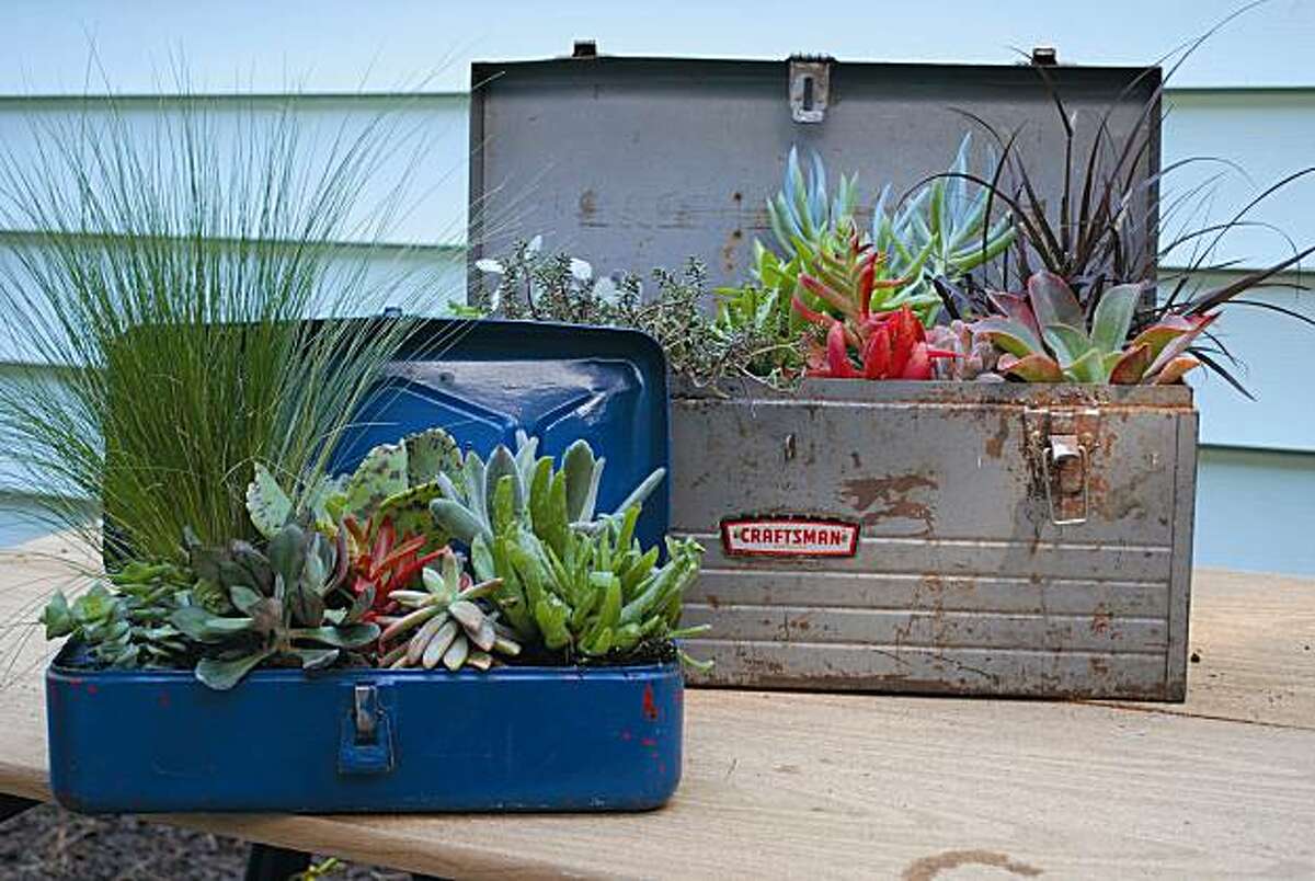 Old toolboxes turned into planters.