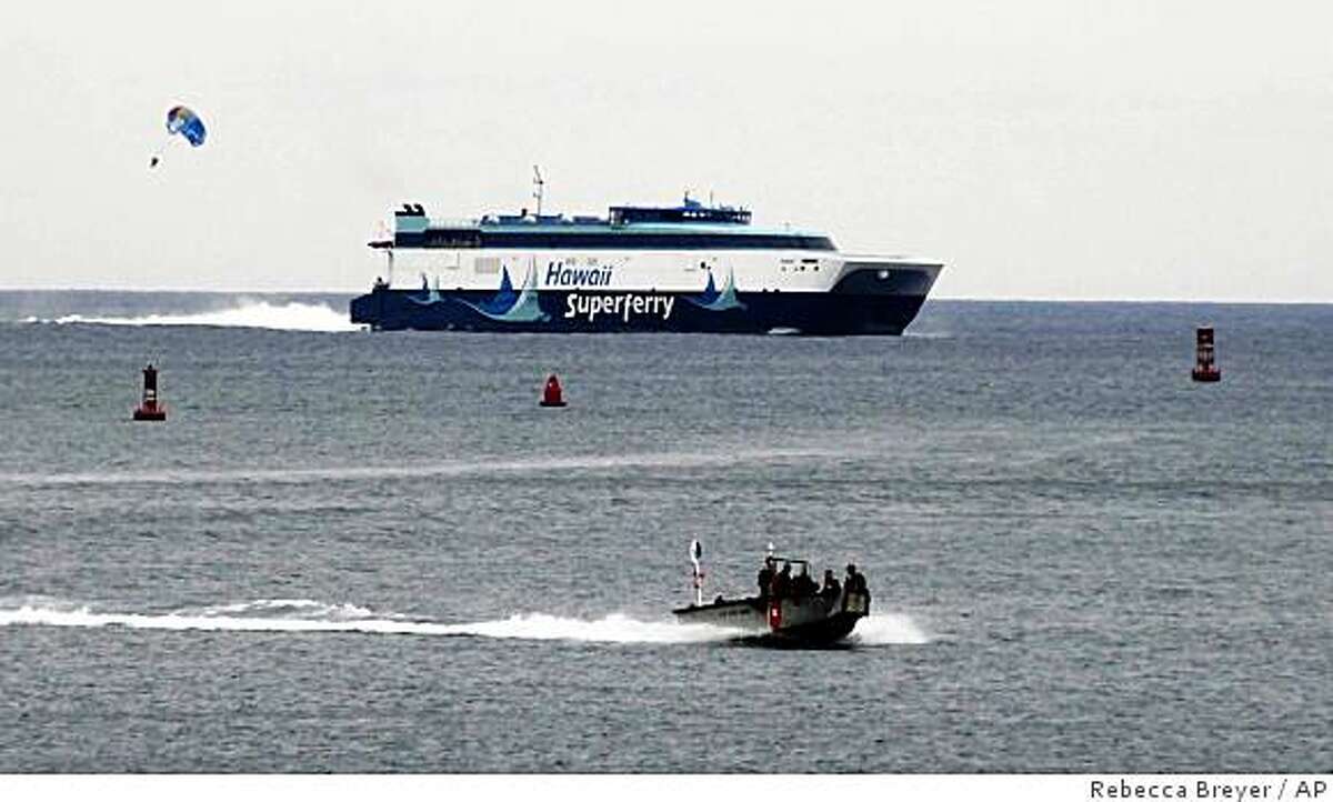 The Hawaii Superferry arrives in Honolulu Harbor on Thursday, March 19, 2009 in Honolulu. The Hawaii Superferry, the state's first island-to-island car and passenger ferry service, is looking for friendlier waters following a court ruling that lawmakers went too far to keep the ship sailing. (AP Photo/The Honolulu Advertiser, Rebecca Breyer) ** THE STAR-BULLETIN OUT **