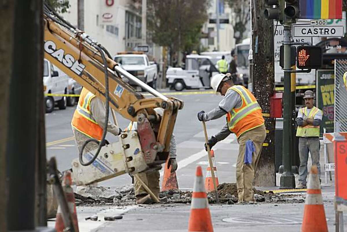 Workers at 18th and Castro Streets work at the site of a natural gas leak. The cause is under investigation on Thursday, October 21, 2010 in San Francisco, Calif.