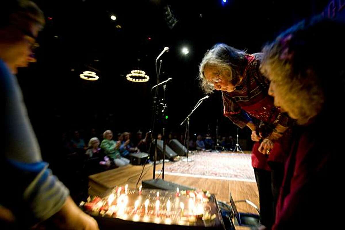 Faith Petric blows out the candles on a surprise birthday cake that was wheeled out to the stage during the show as Faith celebrates her 95th birthday with a concert and Vaudeville variety show at the Freight and Salvage in Berkeley, Calif., on Saturday, September 11, 2010.