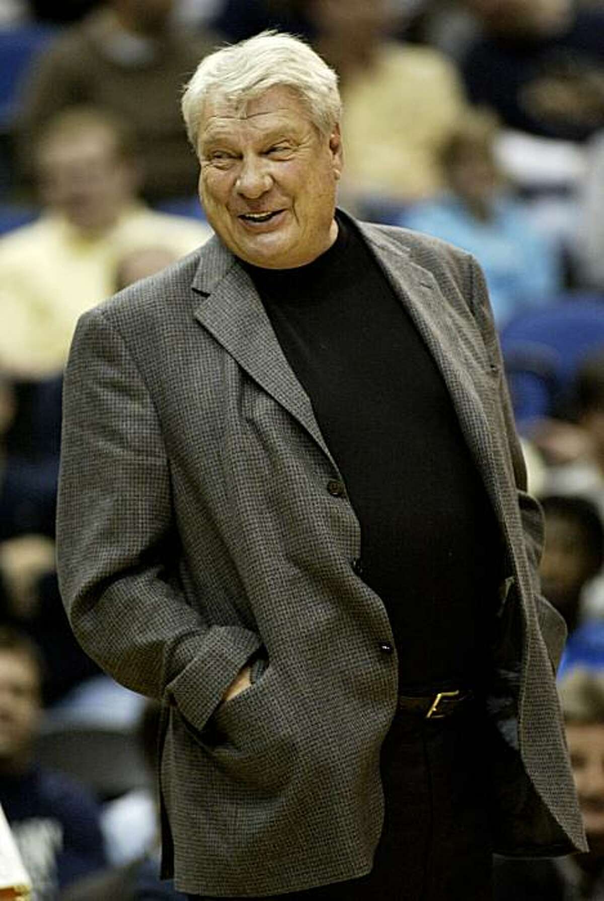 FILE - In this April 7, 2010, file photo, Golden State Warriors coach Don Nelson smiles on the sideline during the first half of an NBA basketball game in Minneapolis. Nelson is expected to part ways with the Warriors on Monday, an NBA source tells The Associated Press.
