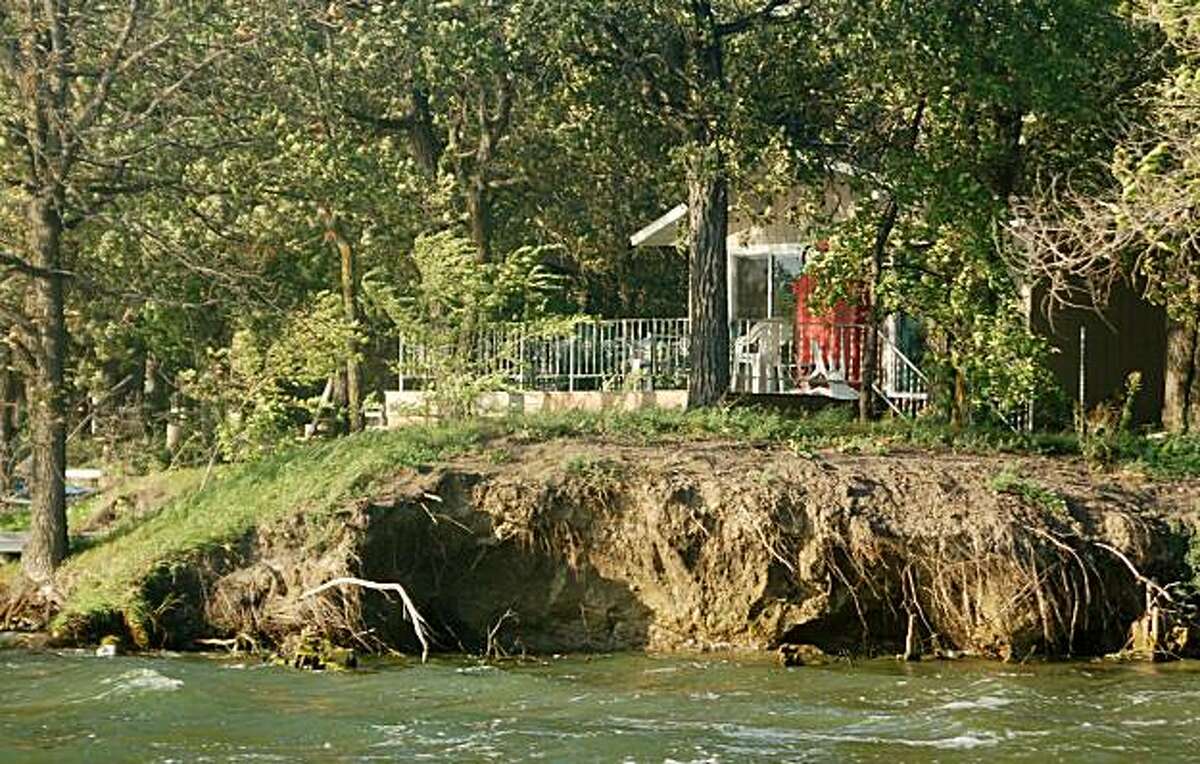 North Dakota lake swallows land and buildings