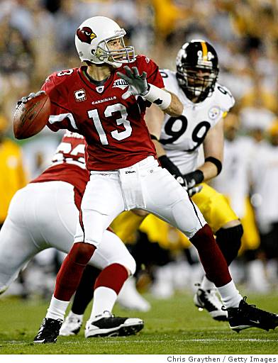 Arizona Cardinals wide receiver Anquan Boldin picks up 11 yards against  Pittsburgh Steelers corner back Ike Taylor in the fourth quarter of Super  Bowl XLIII at Raymond James Stadium in Tampa, Florida