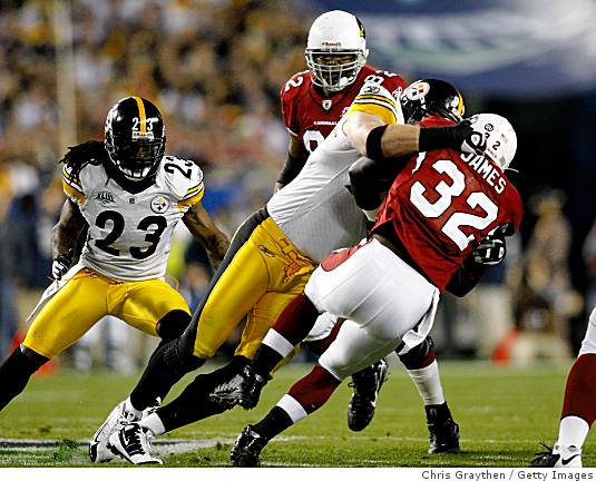 Arizona Cardinals wide receiver Anquan Boldin picks up 11 yards against  Pittsburgh Steelers corner back Ike Taylor in the fourth quarter of Super  Bowl XLIII at Raymond James Stadium in Tampa, Florida