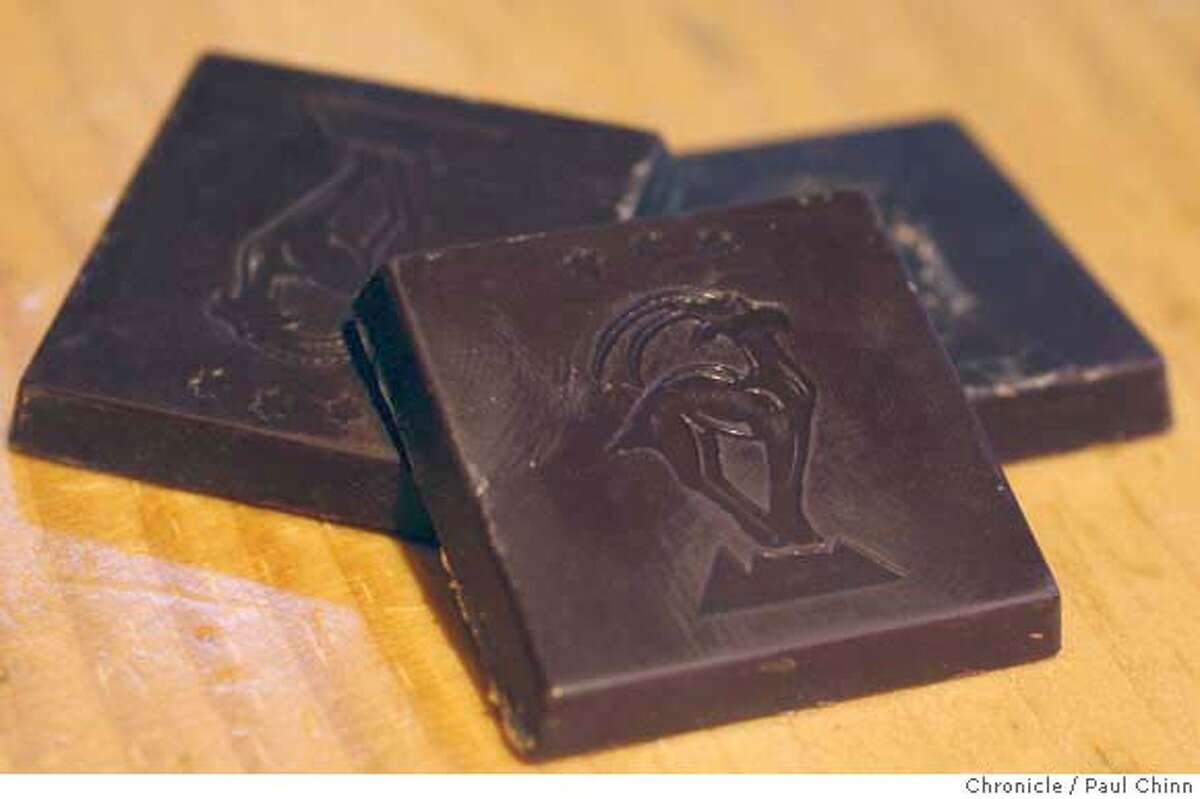 Five gram squares of dark chocolate at the Scharffen Berger chocolate factory in Berkeley, Calif. on Tuesday, July 3, 2007. A study by German researchers claims that a daily dose of dark chocolate helps lower blood pressure. PAUL CHINN/The Chronicle