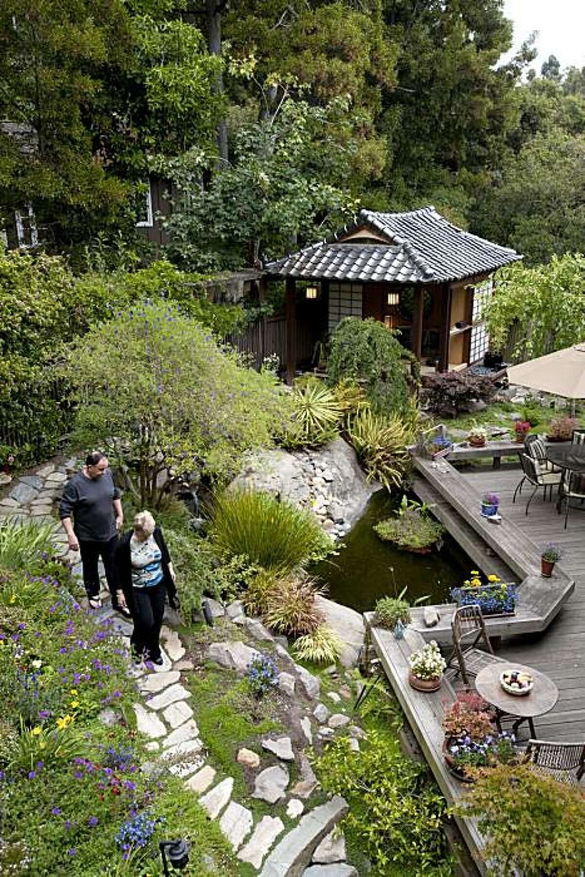 Jim and Bonnie Bell have created a personal sanctuary in their backyard that features a custom-built Japanese style tea house complete with water features and a koi pond and is photographed in Berkeley, Calif., on Sunday, August 8, 2010.
