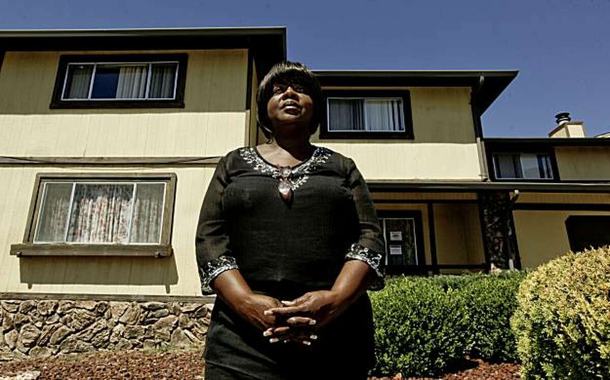 Dianne Huntsberry, on Wednesday Sept. 1, 2010, in front of her former home which she says she was scammed out of in Oakland, Calif. last November of 2009 and is now bank owned. Alameda County Health Department released data today showing the health effects on people's lives who go through the foreclosure process.