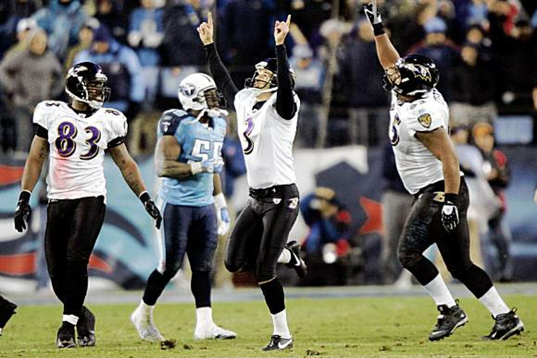 Baltimore Ravens kicker Matt Stover walks across the field during