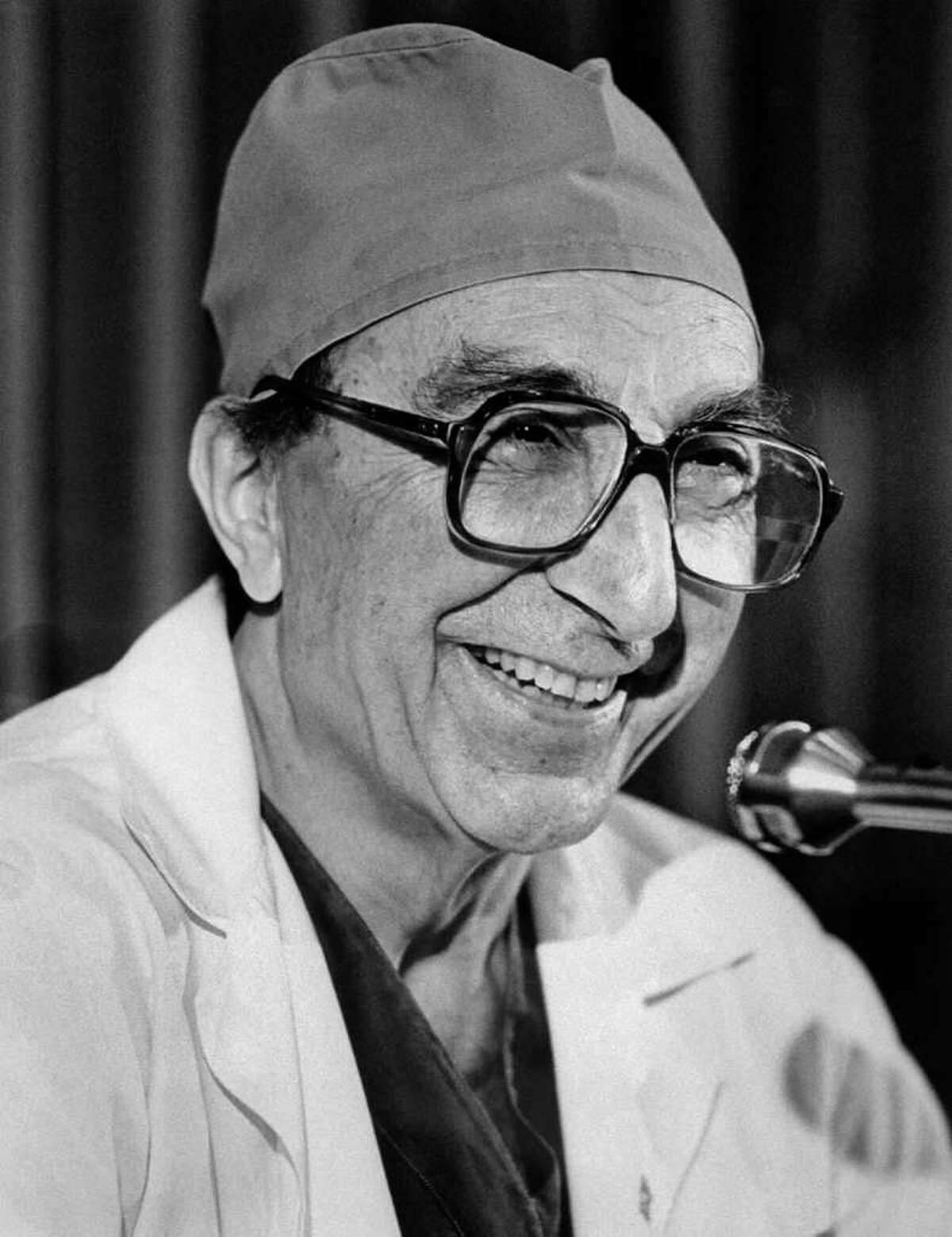 Dr. Michael DeBakey speaks in 1980 after returning from Egypt, where he operated on the deposed shah of Iran.