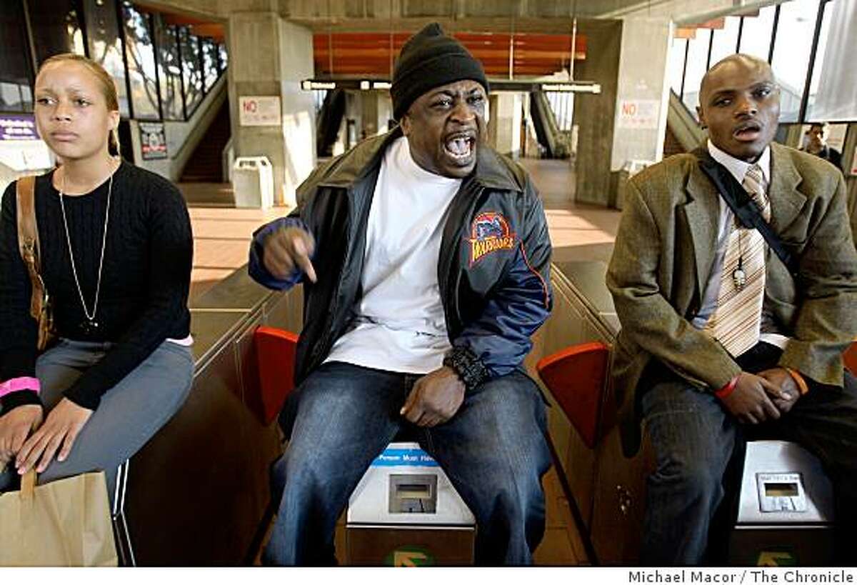 Mandingo, (center) and others managed to shut down the Fruitvale BART station, on Wednesday Jan. 7, 2009, in Oakland, Calif., as hundreds protested the shooting death of Oscar Grant by a BART police officer.