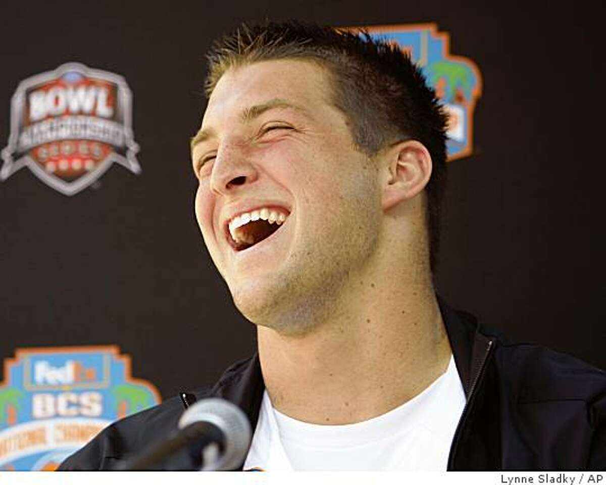 Florida quarterback Tim Tebow laughs during media day at Dolphin Stadium in Miami Monday Jan. 5, 2009. Florida will face Oklahoma for the BCS Championship Thursday Jan. 8, 2009.