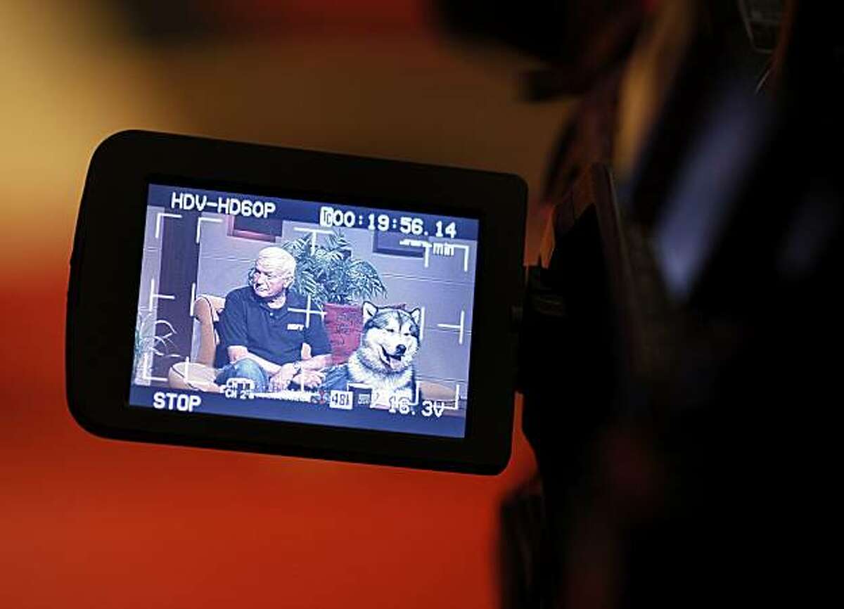 Jim Gabbert and his Malamute Axl Rose as seen through the viewfinder of one of the cameras on the set Wednesday August 11, 2010. Jim Gabbert, the longtime Bay Area television personality, is back on the air at his old TV-20 in San Francisco, Calif.