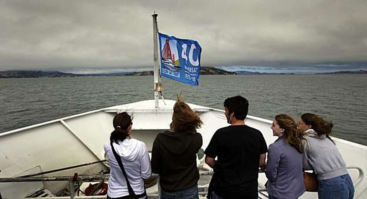 Visitors from Southern California take in the views of the bay from the bow of the San Francisco ferry as it approaches Sausalito Friday August 13, 2010. The Golden Gate Ferry system will celebrate their 40th anniversary serving Fan Francisco, Larkspur and Sausalito this weekend.