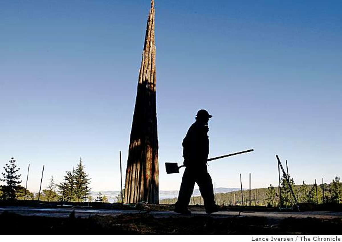 Presidio Trust employee Terry Langan from San Francisco works on the restoration of the Bay Ridge trail in front of the spire, an environmental piece of artwork by Andy Goldsworthy Wednesday Dec 17, 2008.