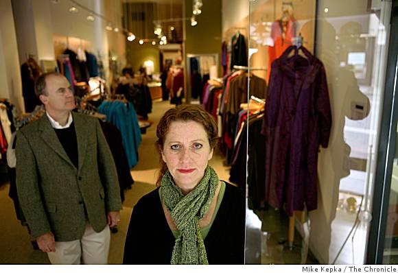 Clothing store owners brainstorm in downturn