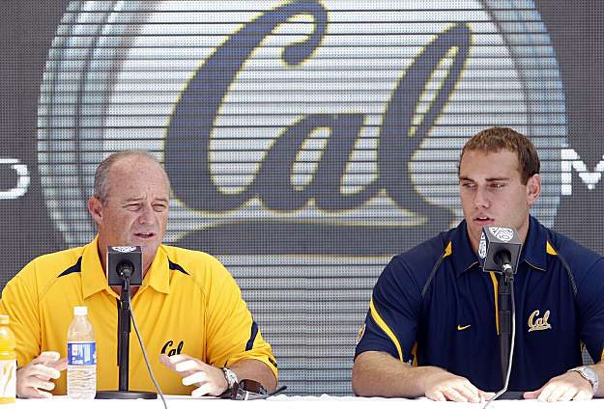 California football coach Jeff Tedford, left, and defensive starter Mike Mohamed, right, speak to reporters during the Pac-10 Football Media Day at the Rose Bowl in Pasadena, Calif, on Thursday, July 29, 2010.