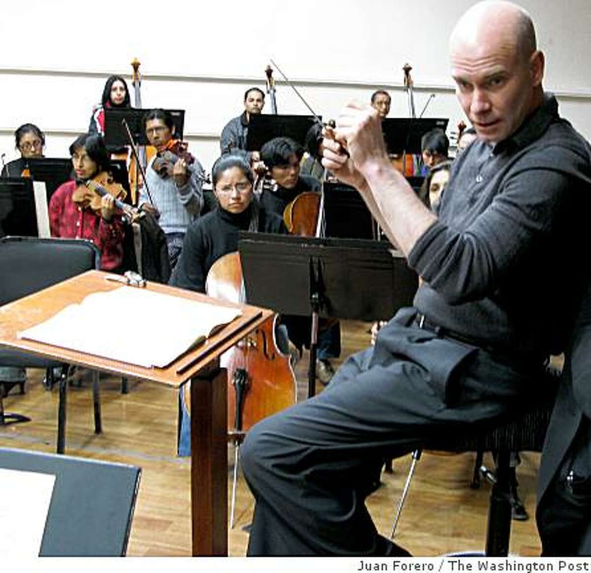 U.S. conductor David Handel has been able to teach, experiment and construct an orchestra from the ground up, and in the process bring the music he loves to barren, forgotten corners of Bolivia. Illustrates BOLIVIA (category e), by Juan Forero (c) 2008, The Washington Post. Moved Thursday, Dec. 18, 2008. (MUST CREDIT: Washington Post photo by Juan Forero.)