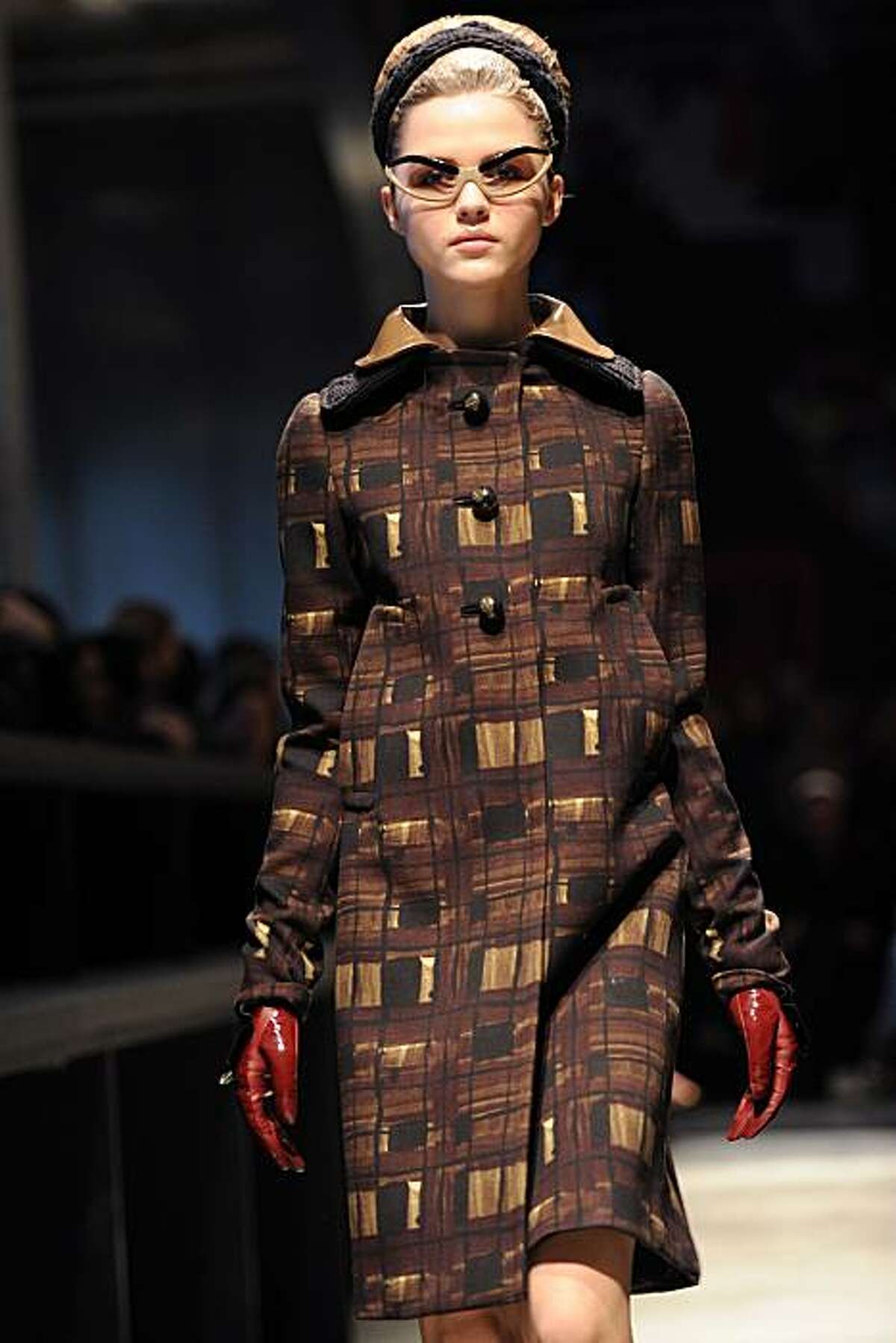 A model displays a creation as part of Prada Fall-Winter 2010-2011 ready-to-wear collection on February 25, 2010 during the Women's fashion week in Milan.