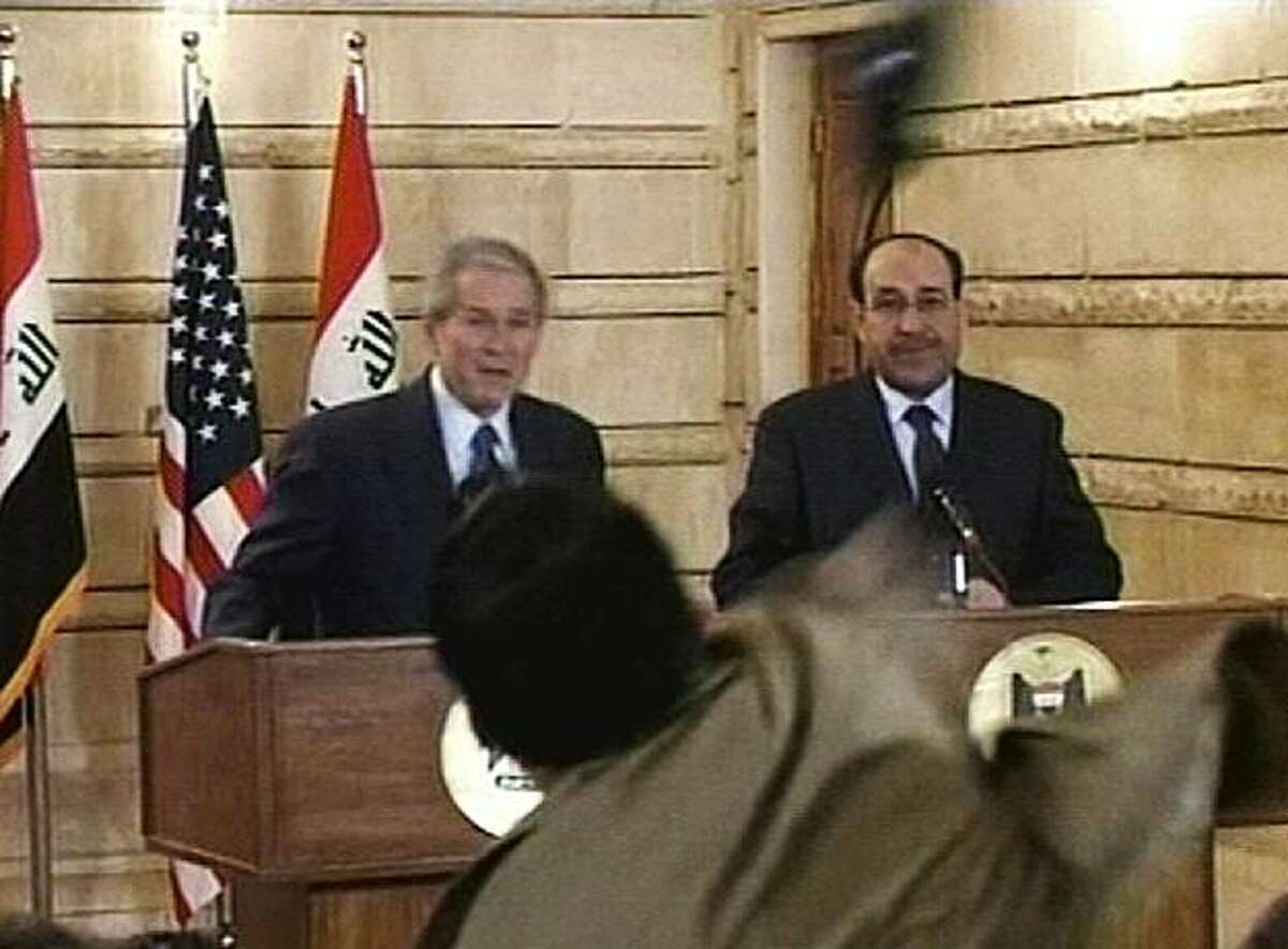 Bush attacked with shoe in Baghdad visit
