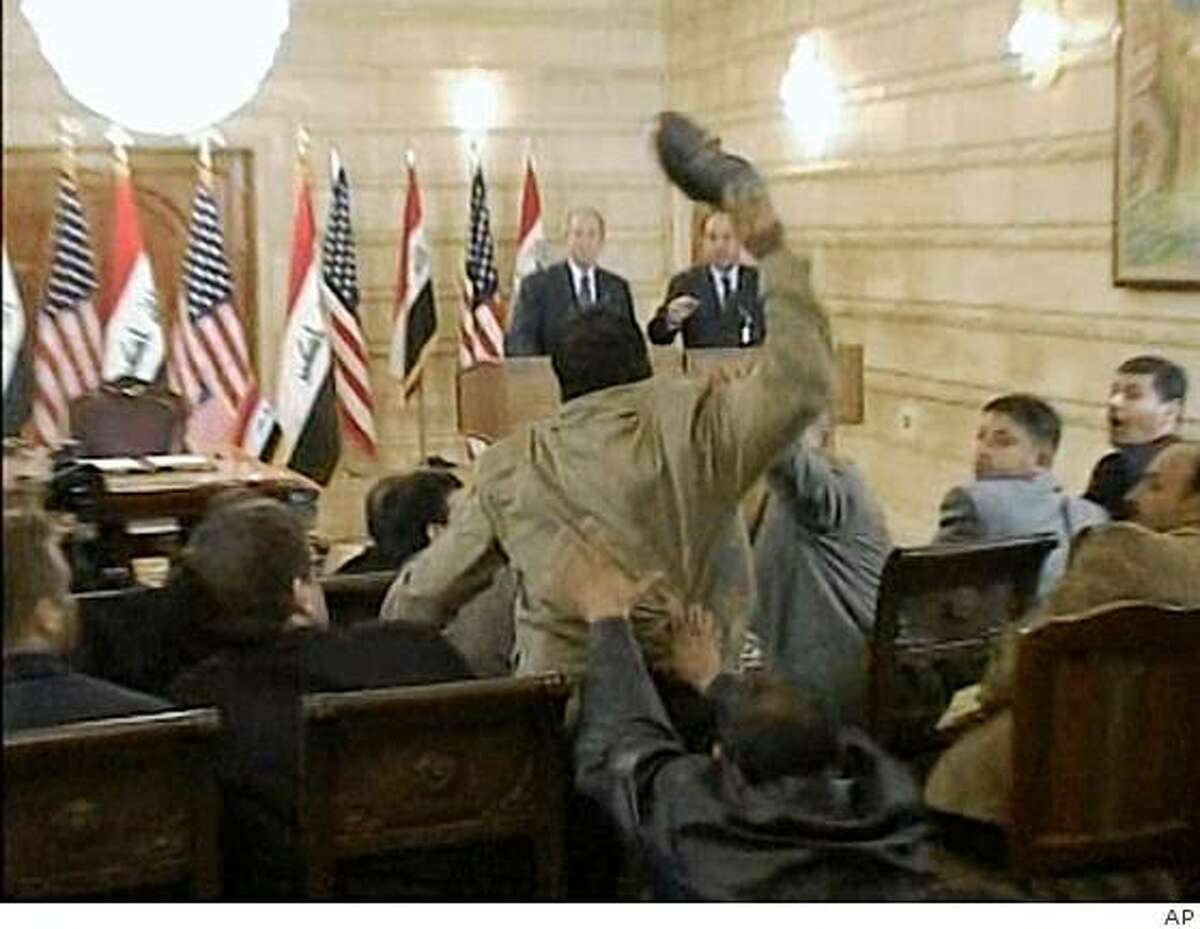Bush attacked with shoe in Baghdad visit