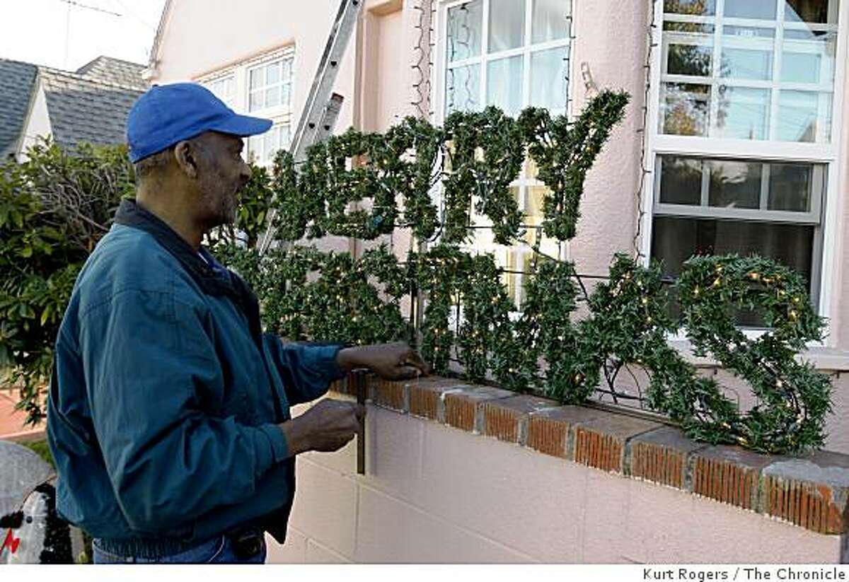 Troy Palmer 66 has lived on Picardy Drive for 21 years and he puts lights on his Merry Christmas sign. on Saturday Dec 13, 2008 in Oakland , Calif