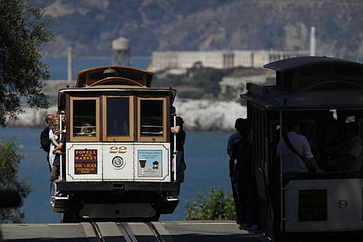 Cable cars meet at the corner of Hyde and Lombard Streets on Thursday Sep. 9, 2009 in San Francisco, Calif.