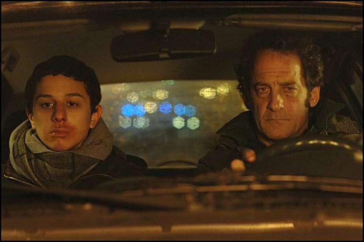 Vincent Lindon (right) and Firat Ayverdi in "Welcome."